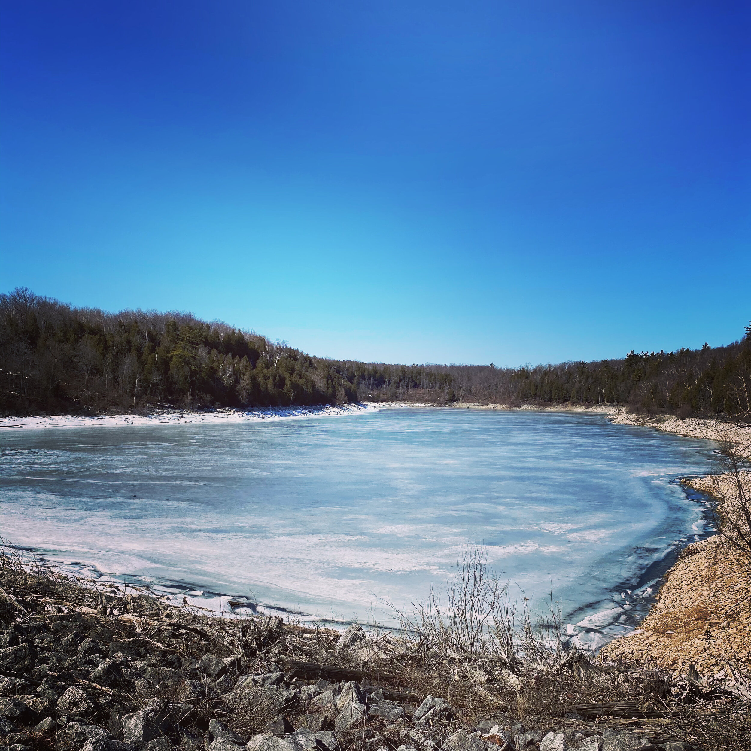 Lake with a blue sky above